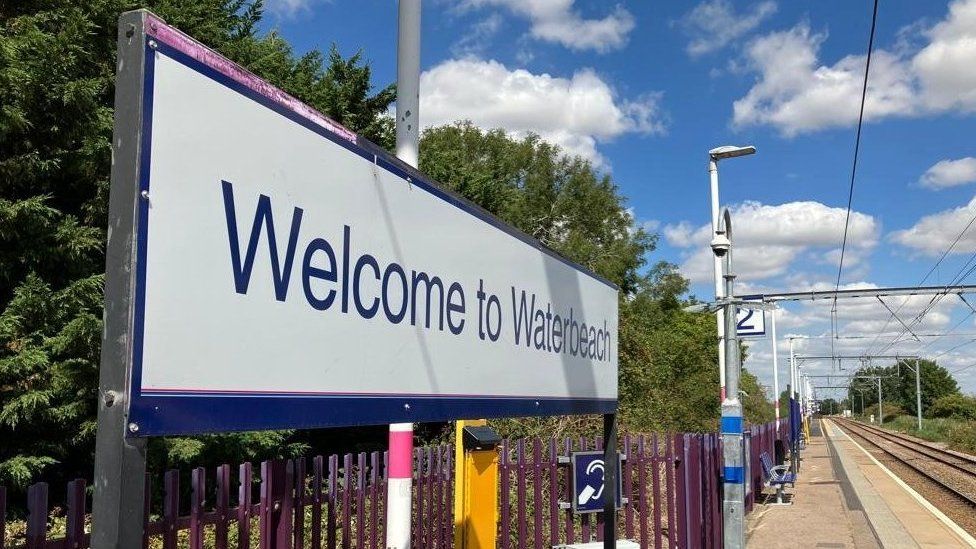 Platform sign saying "Welcome to Waterbeach"