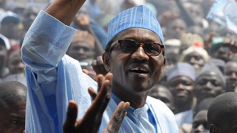 Leading opposition presidential candidate in forthcoming April polls and flag bearer of Congress for Progressive Change, retired General Muhammadu Buhari raises his hand to salute the crowd shortly on arrival to flag off his presidential campaign rally in Kaduna Wednesday, on March 2, 2011