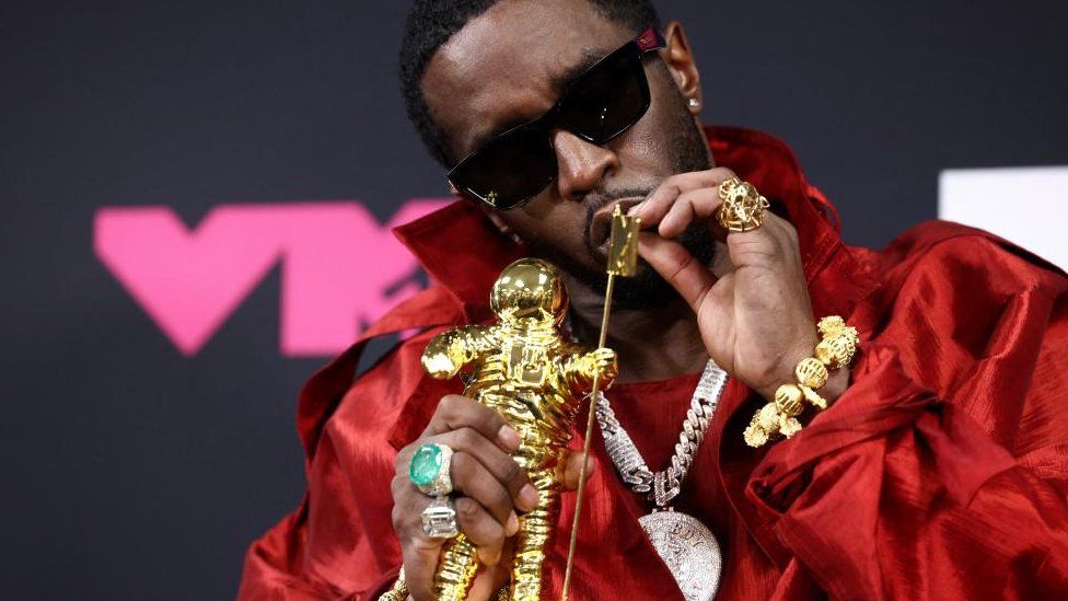 Diddy poses with the Global Icon Award at the 2023 MTV Video Music Awards at the Prudential Center in Newark, New Jersey, U.S., September 12, 2023.