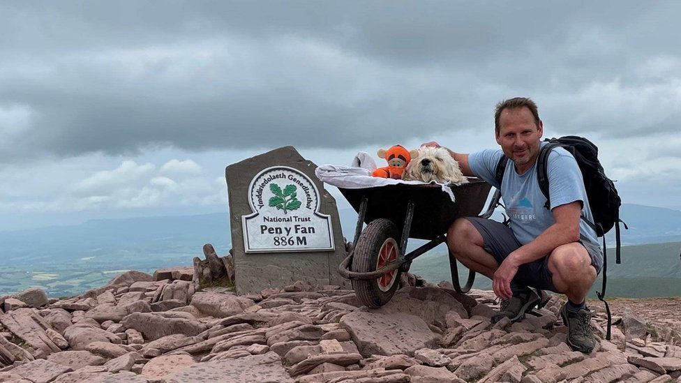 Carlos and Monty at the top of Pen y Fan