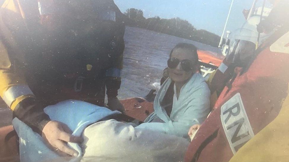 Woman rescued from listing boat in Norfolk