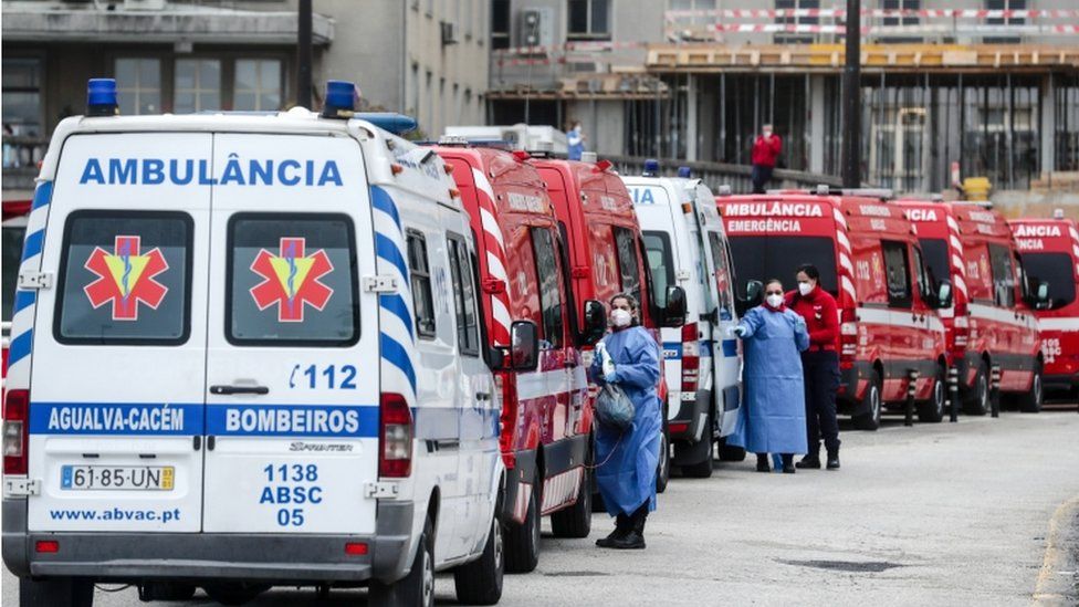 Ambulances queue for pre-screening of patients upon arrival at Santa Maria Hospital in Lisbon, Portugal, 29 January 2021