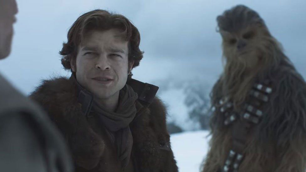 Alden Ehrenreich as Han Solo, with Chewbacca