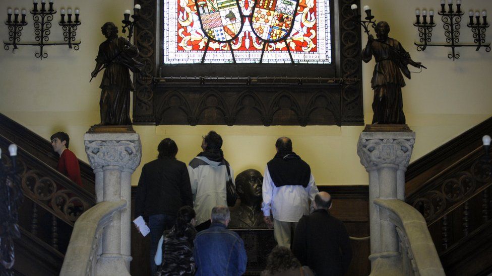 Visitors enter the Pazo de Meiras palace