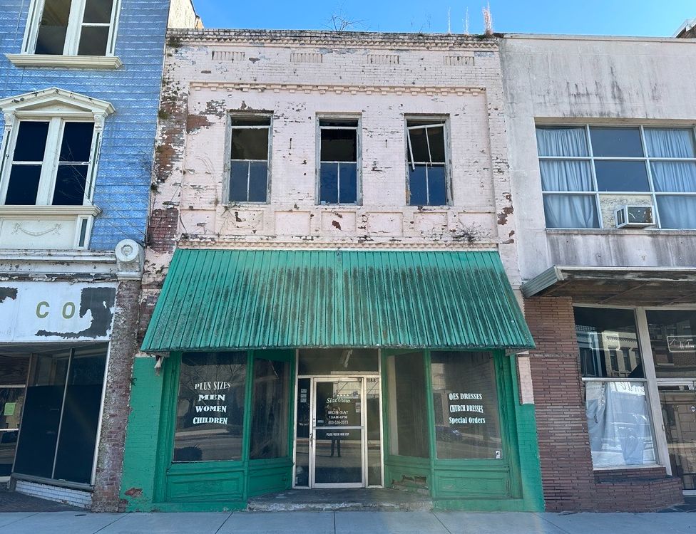 Neglected businesses line the street of Orangeburg's downtown historic district
