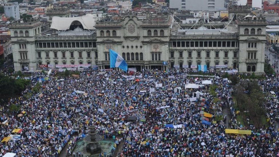 Aerial view taken during a protest to demand the resignation of Guatemalan President Otto Perez as a corruption scandal rocks the government, at Constitution Square in front of the Culture Palace in Guatemala City on May 16, 2015.