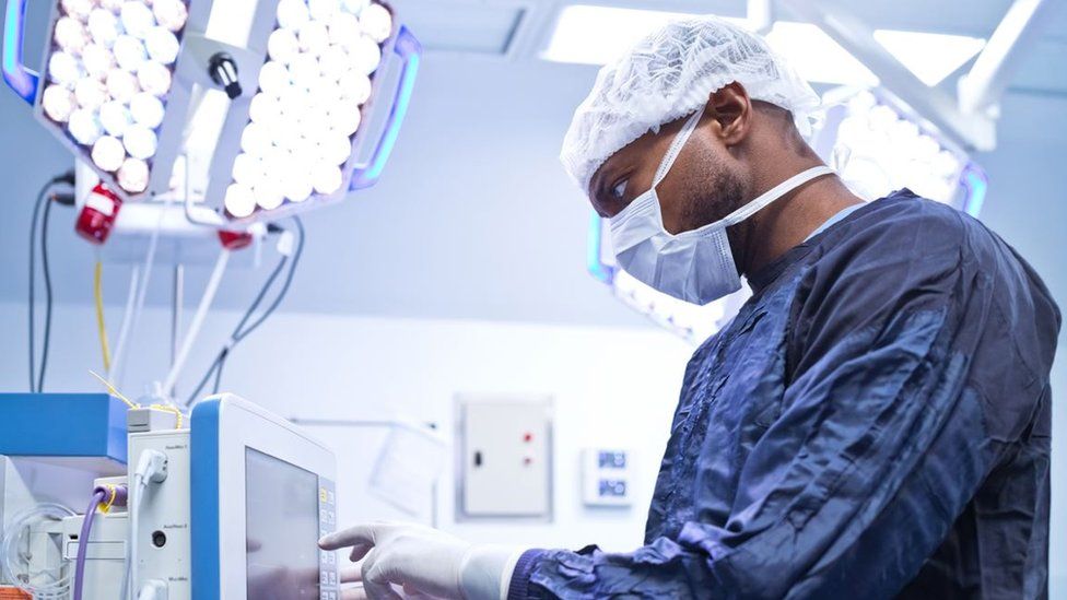 A doc  checking a surface  successful  surgery