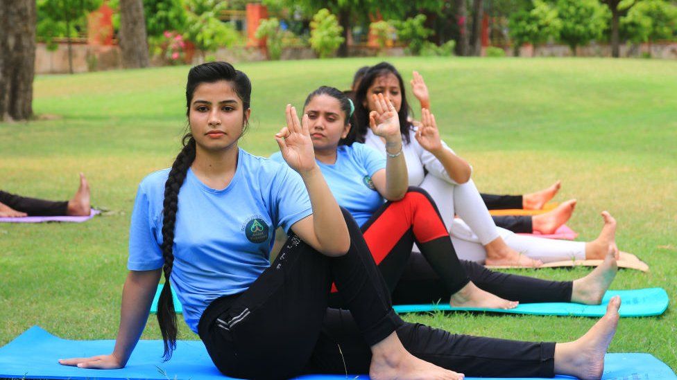 Anant yogalaya students perform yoga ahead the International Yoga Day in Jaipur, Rajasthan, India, on June 20, 2021