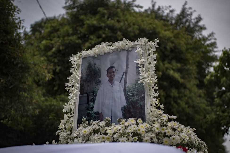 A photo of Kian Delos Santos, 17, on top of the hearse during his funeral in Caloocan city, Philippines, 26 August