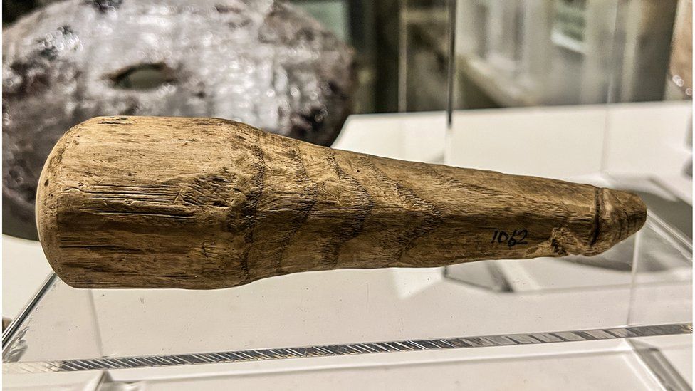 Wooden phallus on display at Vindolanda