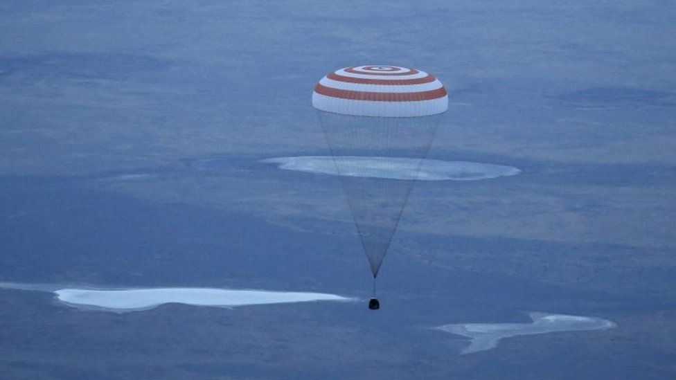 Soyuz spacecraft parachuting into land - 12 September 2015