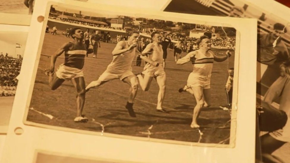 Picture of Mr Jacob and others running towards a finish line