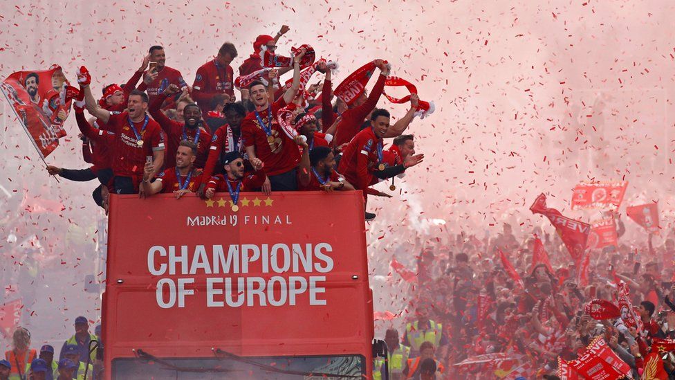 Liverpool players on bus in 2019 parade