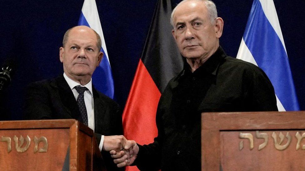 German Chancellor Olaf Scholz, left, shakes hands with Israeli Prime Minister Benjamin Netanyahu, during a press conference in Tel Aviv, Israel, Tuesday, Oct. 17, 2023