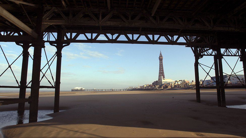 Blackpool Tower is seen from under the Central Pier