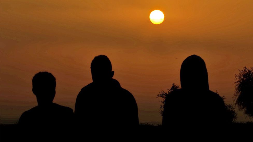 Silhouettes of refugees