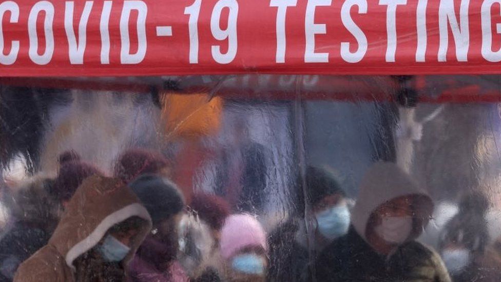Queues in Times Square, New York, as people get tested ahead of the holiday season