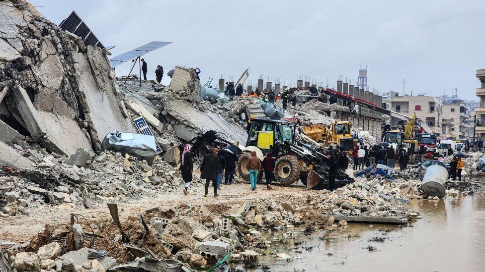 The clean up begins in Idlib after two earthquakes struck nearby Turkey