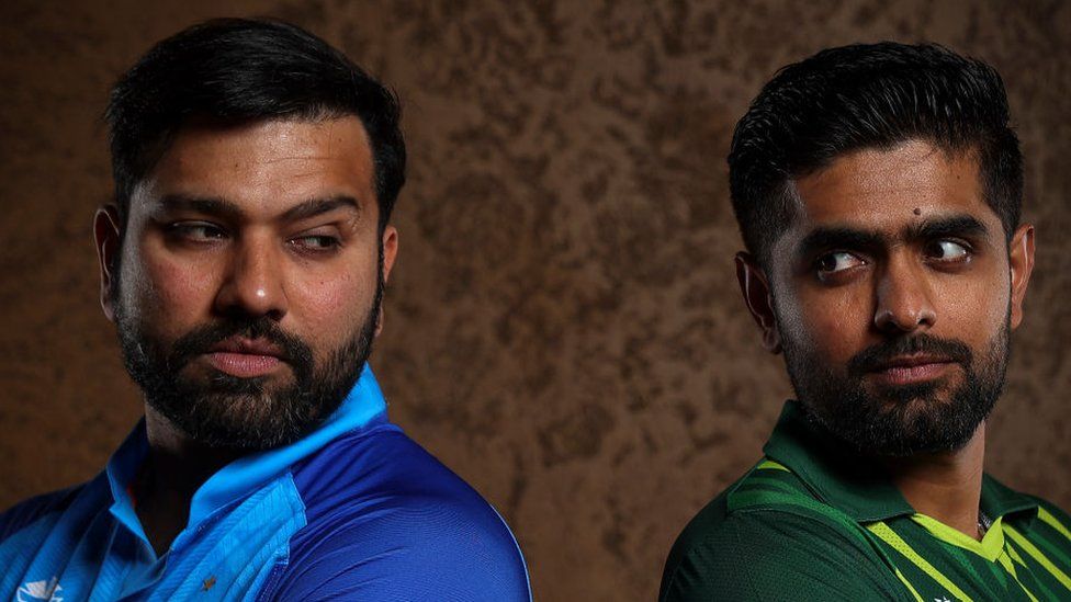 Indian captain Rohit Sharma, left, with his Pakistani counterpart