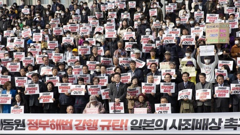 Survivors of Japanese forced labour demonstrate with opposition party members in front of the National Assembly in Seoul, South Korea, 07 March 2023.