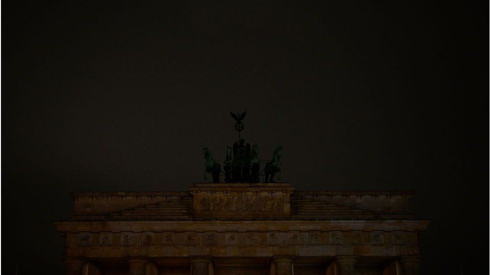 The lights of the Brandenburg Gate in Berlin are switched off during "Earth Hour" on March 25, 2023