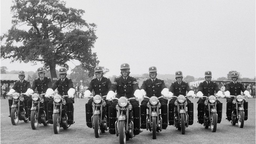 aing Sports Ground, Rowley Lane, Elstree, Barnet, London, 17/06/1961. The Metropolitan Police Motorcycle Precision Ride Team putting on a demonstration at a Laing sports day at Elstree. This image was published in July 1961 in Laing's monthly newsletter 'Team Spirit'. Artist John Laing plc. (Photo by Historic England/Heritage Images via Ge