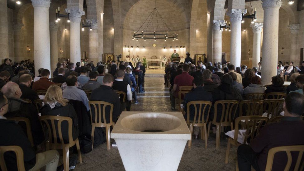 Christians attend a mass at the Church of the Multiplication of the Loaves and Fish in Tabgha, on February 12, 2017, upon its reopening following eight months of renovation