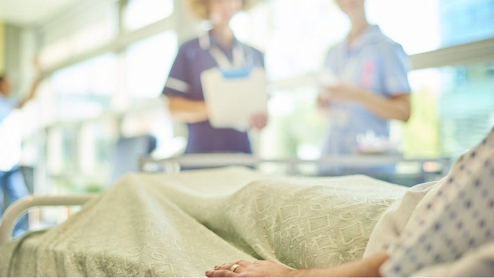 Nurses with patient