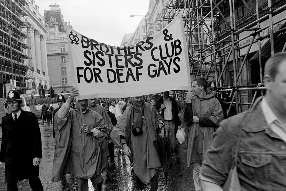 People attend the Pride march in 1982