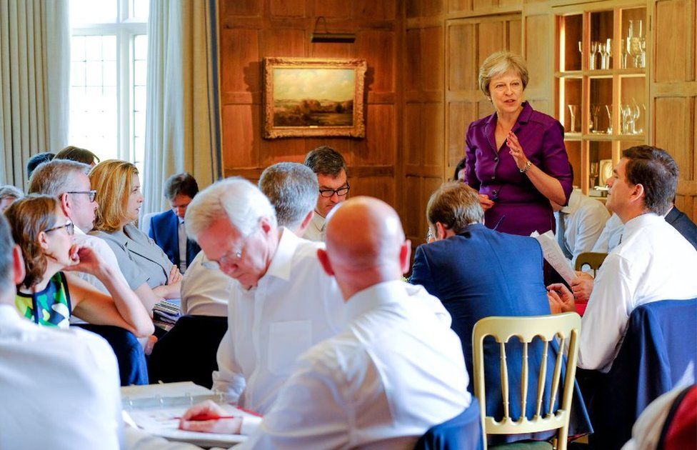 May and members of her Cabinet meet at her country retreat Chequers