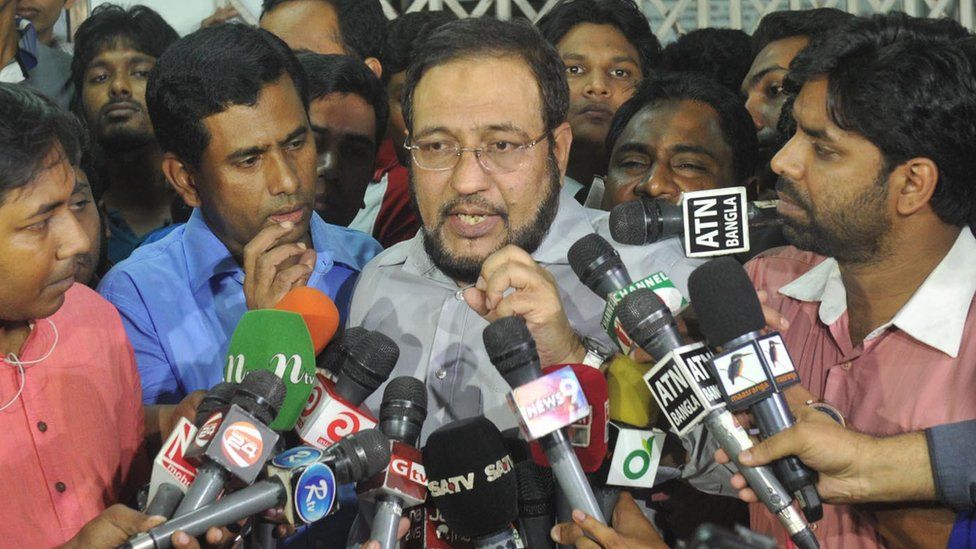 Abdulahail Amaan Azmi speaking to reporters after the death of his father in October 2014