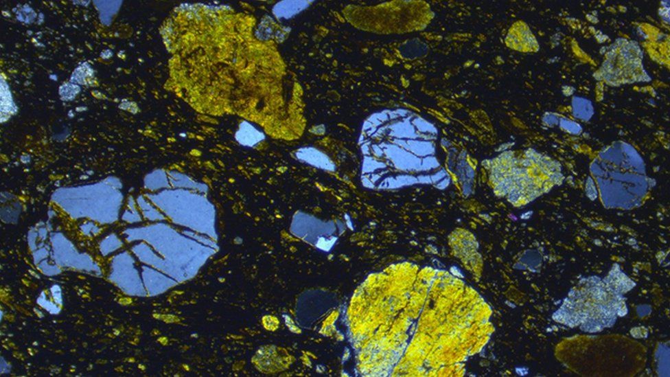 A thin section view of meteoritic ejecta deposit found on Skye