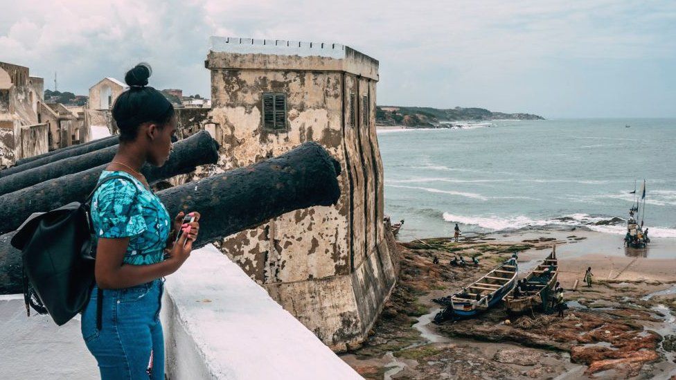 A woman at Ghana's Cape Coast Castle in 2019