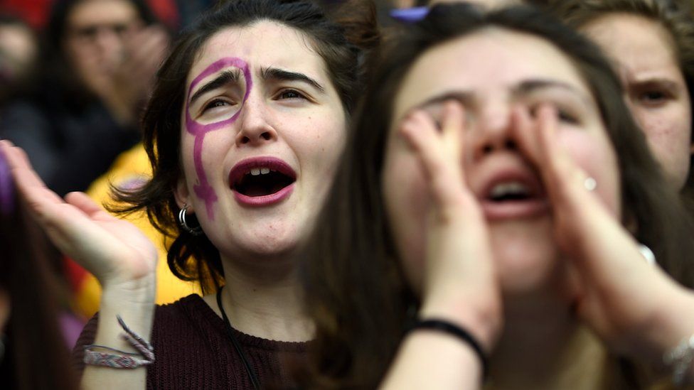 Demonstrators attend a protest during a one day strike to defend women"s rights on International Women"s Day in Barcelona