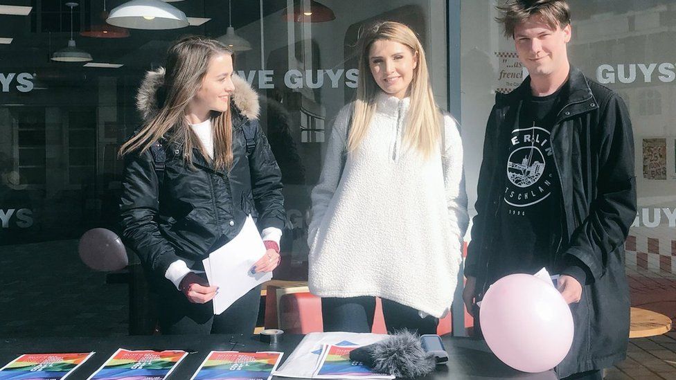 Brittany Pettibone (left), Lauren Southern (middle) and British activist Caolan Robertson (right), at a stall in Luton town centre