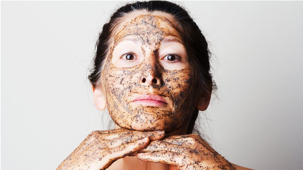 woman with face scrub on
