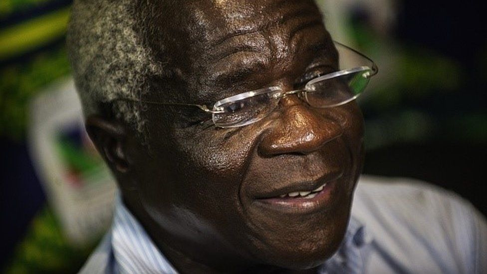 Afonso Dhlakama (C) speaks during an interview on October 11, 2014 in Maputo, Mozambique