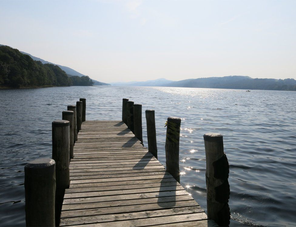 An empty jetty on a lake