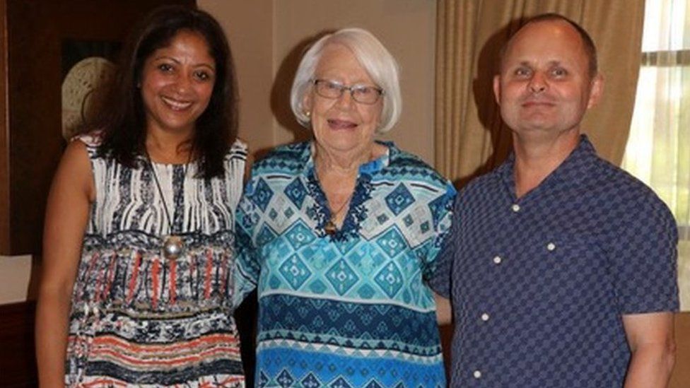 Andrew (right) with his wife, Anu, (left) and mother, Helen, (centre)