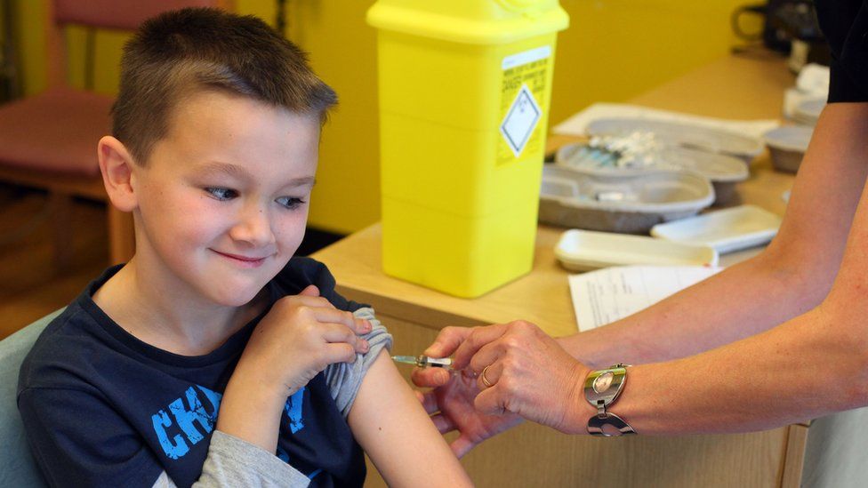 boy being vaccinated