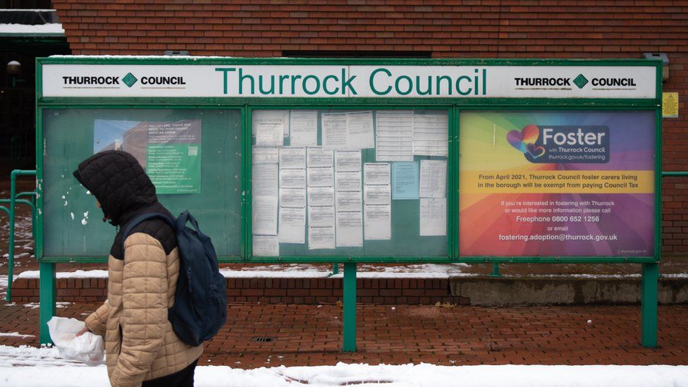 A man walks outside a Thurrock Council building