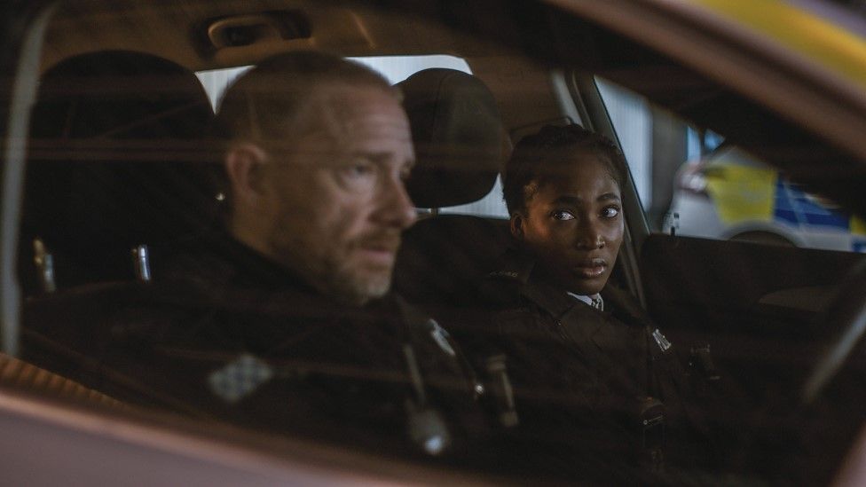 Martin Freeman and Adedayo Adelayo as police officers in The Responder