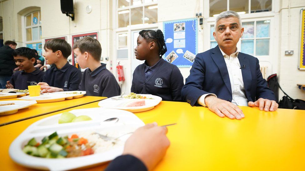 Sadiq Khan during lunchtime at his old school in Tooting Bec