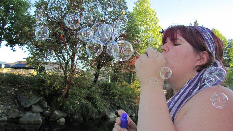 Katje blowing bubbles