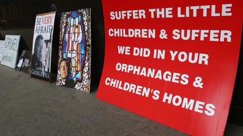 A protest poster at the Royal Commission into Child Abuse, Australia