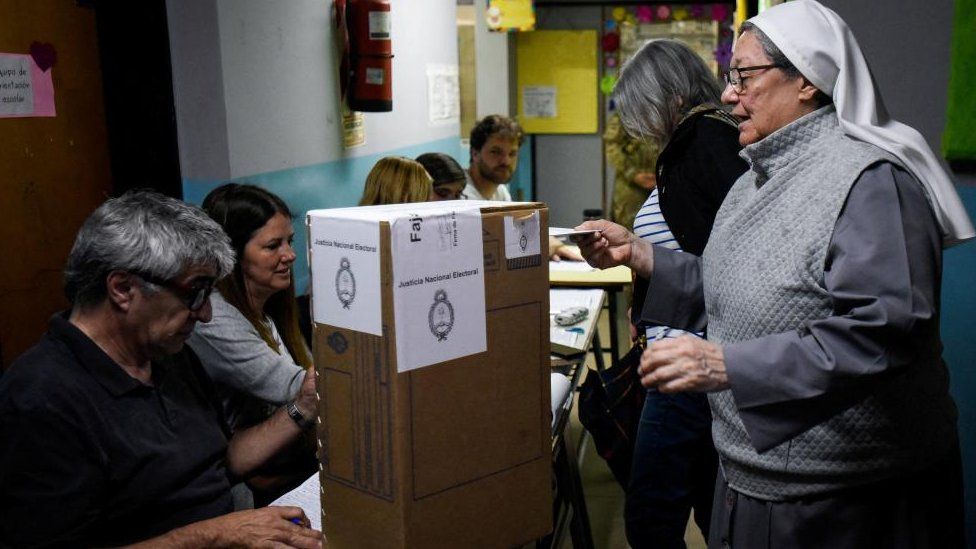 A nun casts her ballot at a polling station during Argentina's presidential election, in Tigre, on the outskirts of Buenos Aires, Argentina, October 22, 2023.