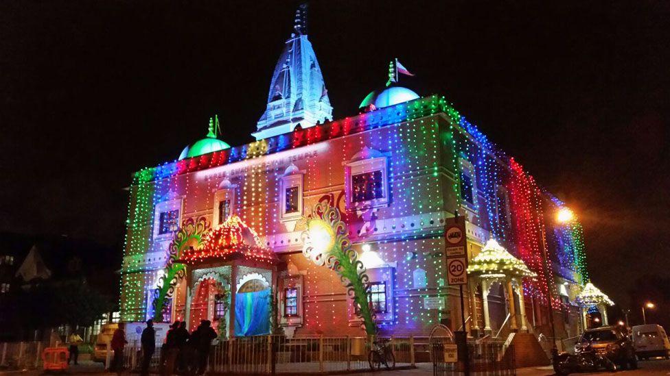 Shree Swaminarayan Temple in Willesden, London, covered in light