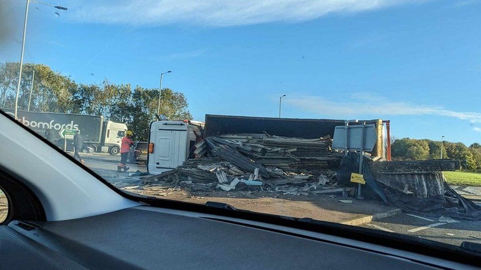 Overturned lorry on Lancaster roundabout