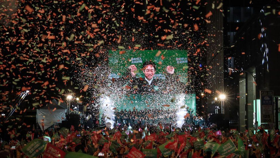 Confetti flies over the stage and crowd as Taiwan's Vice President and presidential-elect from the Democratic Progressive Party (DPP) Lai Ching-te and his running mate Hsiao Bi-khim speak to supporters at a rally at the party's headquarters on January 13, 2024 in Taipei, Taiwan.