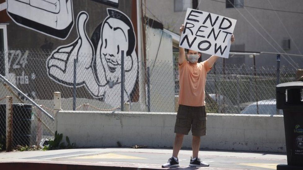 A man in Los Angeles, California, calls for rent forgiveness after job losses in the state